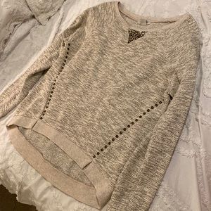 Cute sweater with metal detail